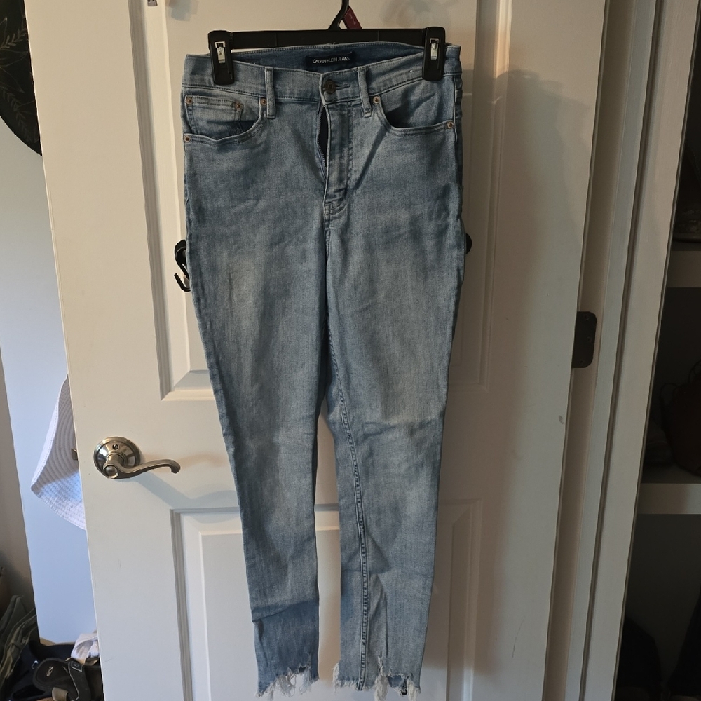 Calvin Klein Blue High Rise Jeans with Distressed Detailing